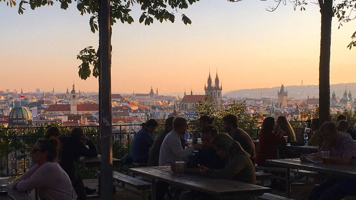 Young people hang out at Prague's most beautiful beer garden after work